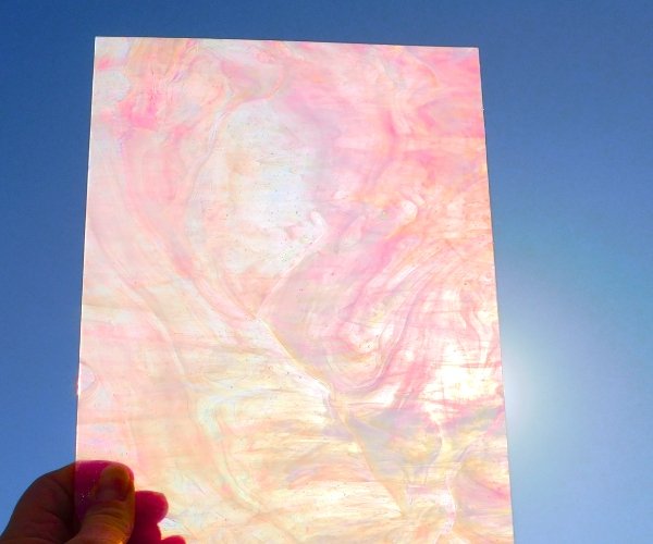 Designer Pink & White Iridized Stained Glass Sheet Shining in the sunlight