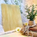 Wissmach Dark Amber & White Opal Stained Glass Sheet Light Flesh toned glass with a plant and daisies in the Mountain Woman Products studio