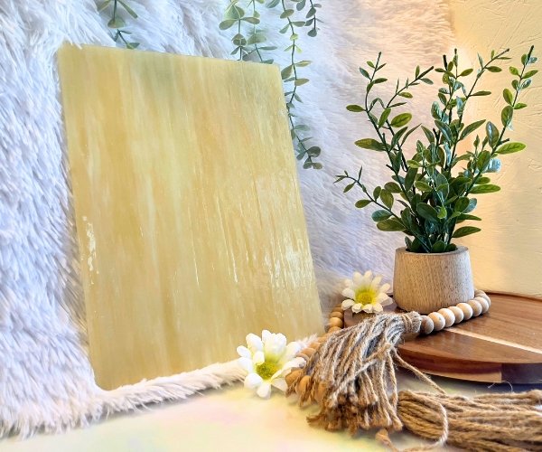 Wissmach Dark Amber & White Opal Stained Glass Sheet Light Flesh toned glass with a plant and daisies in the Mountain Woman Products studio