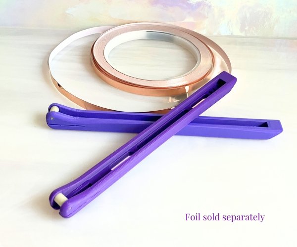 Creator's Hand Foiler in purple shown with foil Mountain Woman Products