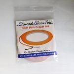 Stained Glass Foil 1/4" Silver Back Copper Tape on table