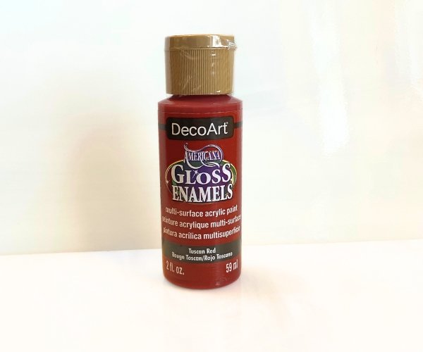 DecoArt Gloss Enamels Glass Paint in Tuscan Red in front of white glass in the Mountain Woman Products Studio