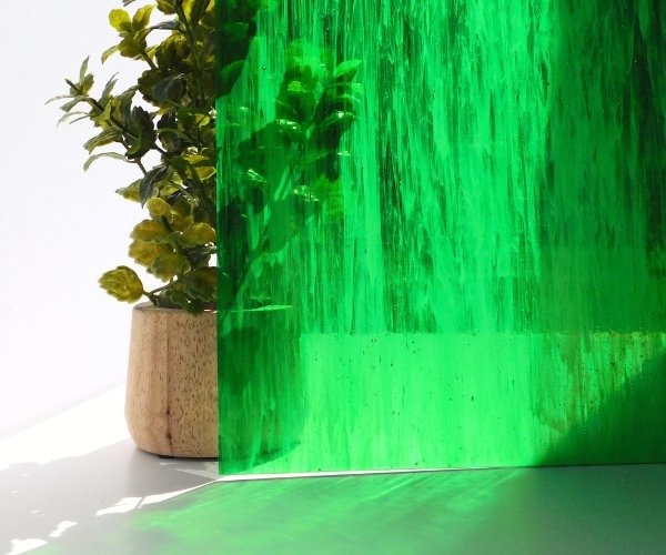 DG1083 Designer Medium Green Wispy Opal Stained Glass Sheet with plant showing opacity Mountain Woman Products
