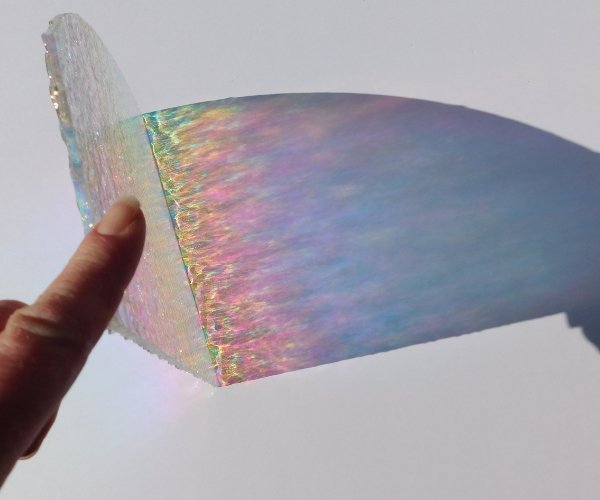 Dichroic Ripple Rainbow 2 on Clear Stained Glass Sheet showing light shining through all the colors Mountain Woman Products