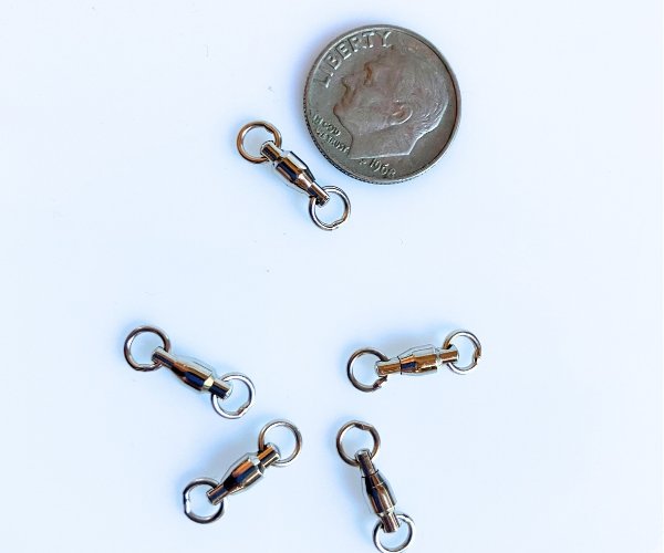 Spinners for Stained Glass with a dime to show size Mountain Woman Products