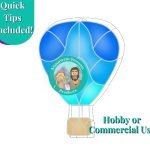 Hot air balloon stained glass pattern with ombre colors of blue to aqua and beige basket Mountain Woman Products logo