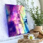 Wissmach Midnight Blue Transparent Luminescent 96-20 with pink yellow and aqua iridescence and a plant and daisies in the Mountain Woman Products studio