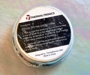 Thermaltronics Tip Tinner for fixing soldering iron tips in round metal tin back side view Mountain Woman products