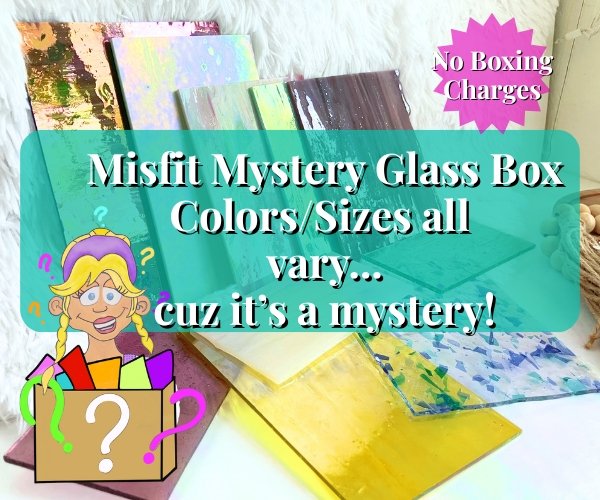 Misfit Mystery Glass Box with a variety of random stained glass pieces pictured are yellow purple green white iridescent rose and a fracture aqua and blue glass with the Mountain Woman Products logo girl holding a box of glass with a question marks on it