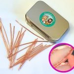 copper wire scraps for glass gaps or boxes laying on a white table with a tin with mountain woman products logo and a closeup of gaps in glass between foil