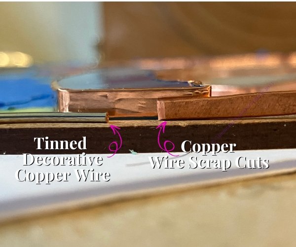 foiled piece of stained glass showing depth of tinned decorative copper wire vs copper wire scrap cuts for filling in gaps in glass Mountain Woman Products