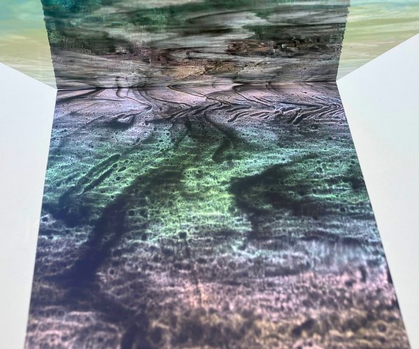 Designer Glass Iridized Black & Clear Streaky Glass DG 1039 showing refraction with black clear and pink and aqua Mountain Woman Products Studio