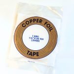 Edco 1/4" Copper Back copper foil tape in a clear bag with blue lettering in Mountain Woman Products studio