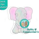 elephant baby stained glass pattern with grey body head legs and trunk and pink ears with wirework eyelashes and toenail showing mountain woman products logo of blonde haired girl with braids and brown haired bearded dude in front of a mountain