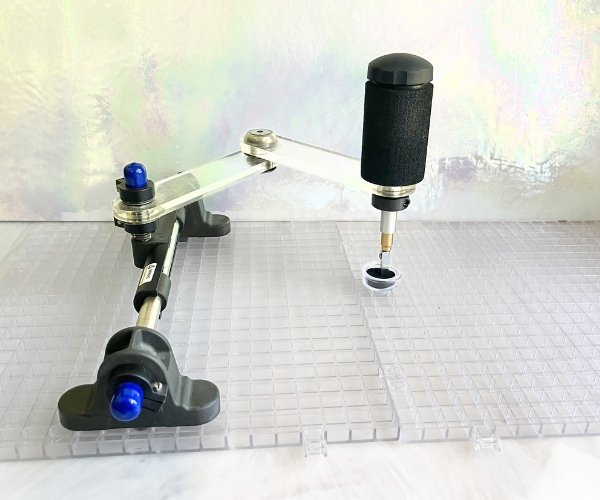 Creator's Cutter's Mate Mini Glass Cutter in a waffle grid with a white background in the Mountain Woman Products studio