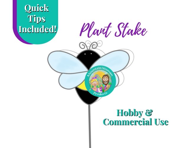 Bee Plant Stake showing black and yellow bee with light blue transparent wings on a stake with mountain woman products logo