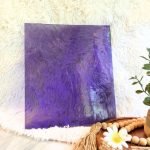 Designer Glass Light Lavender Fusible Stained Glass Sheet showing a bluey purple cathedral glass in front of a white background at the Mountain Woman Products studio