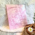 Designer Glass Pink & White Fusible Stained Glass Sheet in a bubble gum pink type color with a white background and a plant in the Mountain Woman